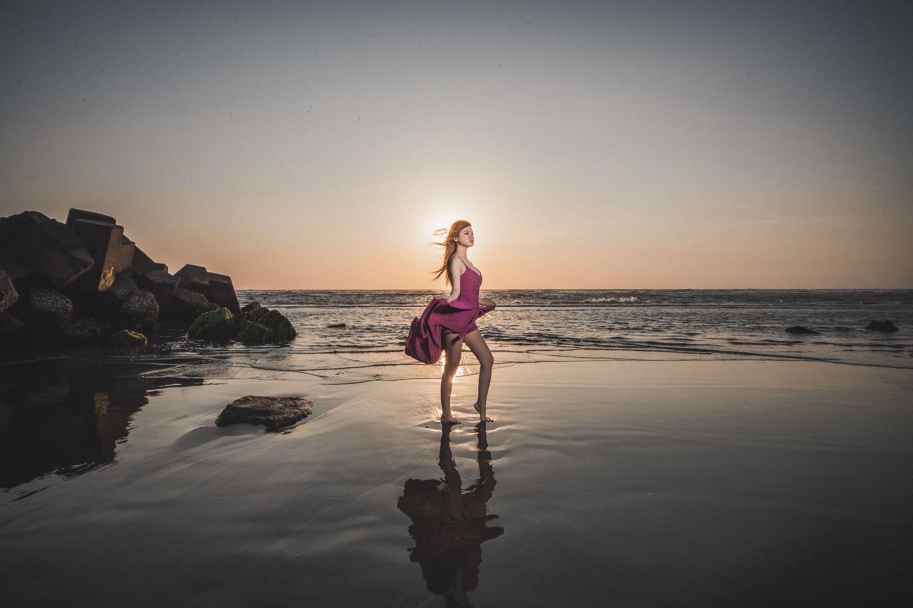 Woman in a bikini by the water