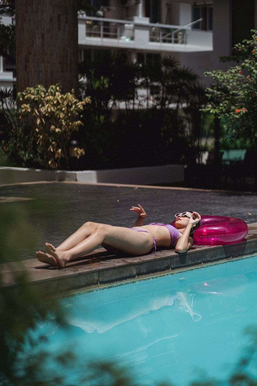 Woman in a bikini by the water
